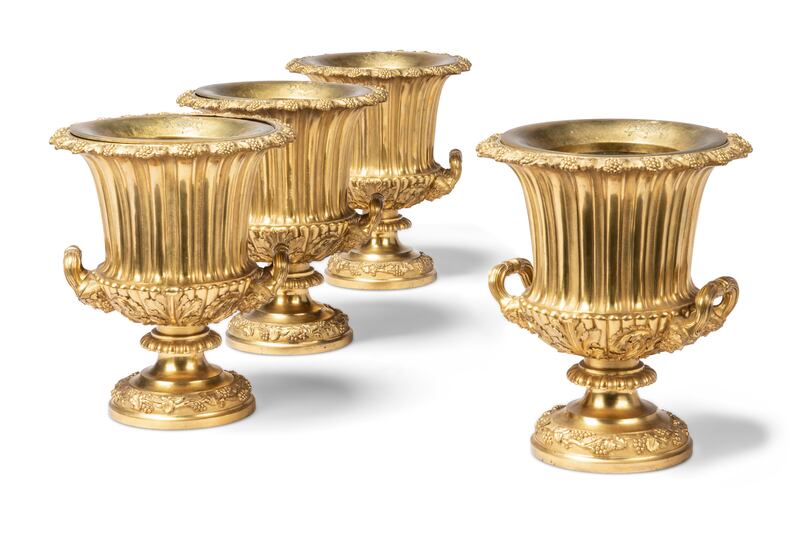 A set of four George IV gilt bronze wine coolers bearing the coat of arms of the Marquess of Sligo, from Westport House (£20,000–£30,000/€23,000–€34,000