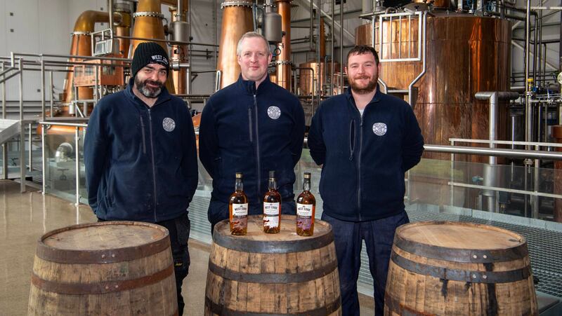 A place built and run by the people, for the people... Many of the distillery's staff are West Cork natives. Pictured are James Goggin, Brian Creedon and Ian Jennings in the Still House at Skibbereen. Photograph: Dan Linehan