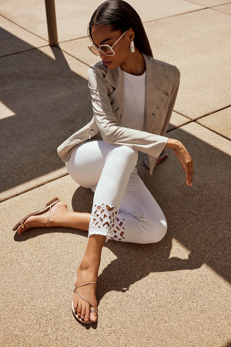 Faux suede jacket, €279, and white laser cut jeans, €199, from Joseph Ribkoff