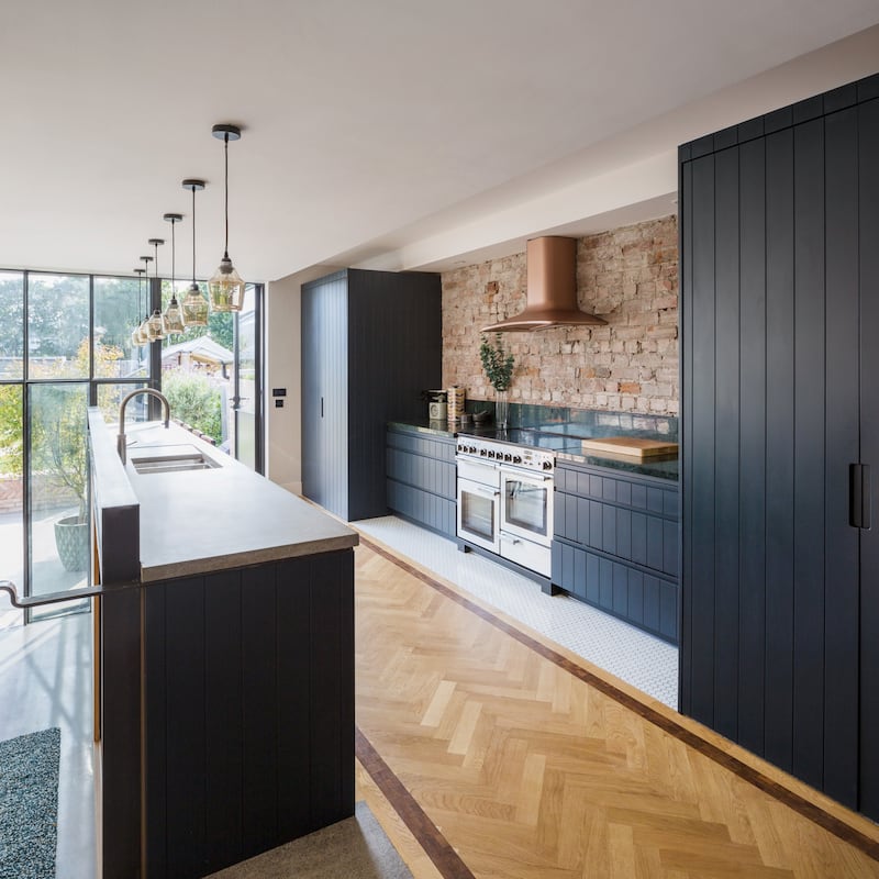 The kitchen, with flooring detail. Photograph: Ste Murray