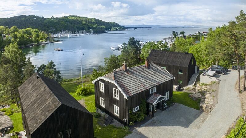 This house in Naersnes boasts a small beach for swimming