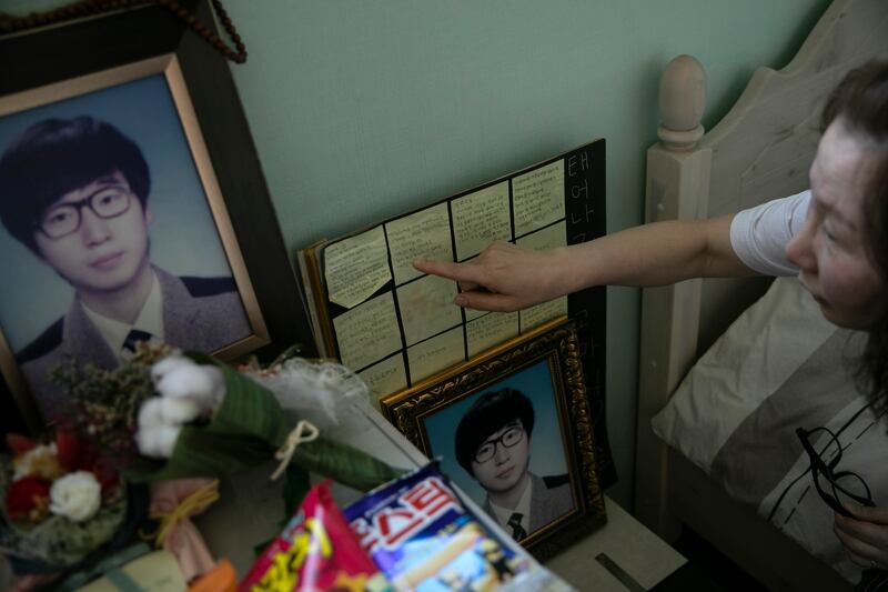 Kim Mi-ok, the mother of Lee Ho-jin, in his bedroom in Ansan, South Korea. 