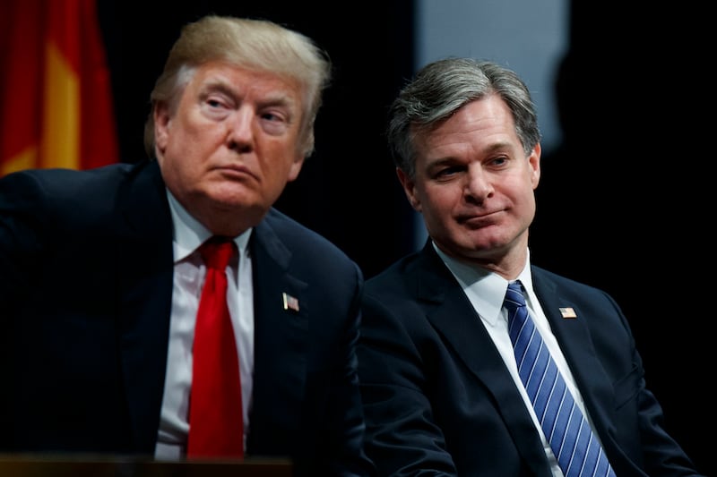 President-elect Donald Trump with Christopher Wray, photographed during the FBI National Academy graduation ceremony in 2017, in Quantico, Virginia. Photograph: AP