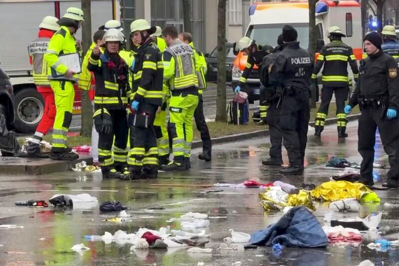 Emergency services attend the scene of an accident after a car hit a group of people in Munich, Germany. Photograph: Peter Kneffel/dpa/ AP