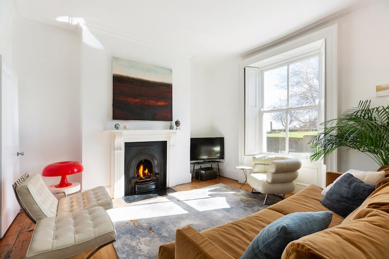 Off the inner hall is a bright livingroom overlooking the park and providing sea views out to Dublin Bay.  