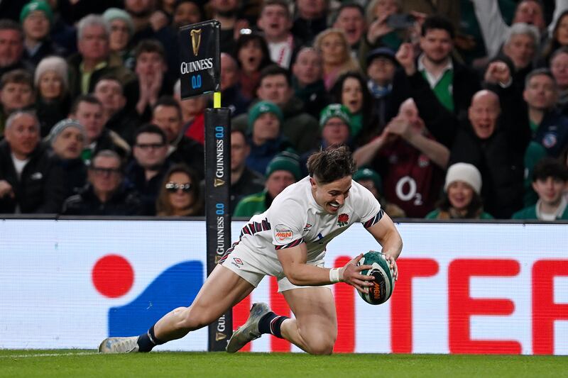 Cadan Murley of England looks delighted to dive in and score on his international debut. Photograph: Charles McQuillan/Getty