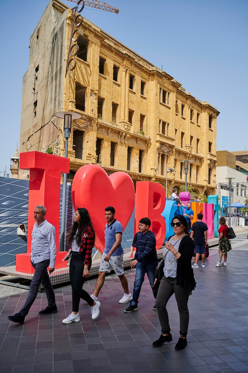 “I Love Beirut”: In the background is a building ravaged during the Lebanese civil war. Photograph: iStock