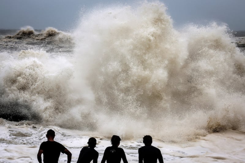 Record-breaking waves caused by the outer fringe of Cyclone Alfred at Point Danger in Coolangatta. Photograph: David Gray/AFP