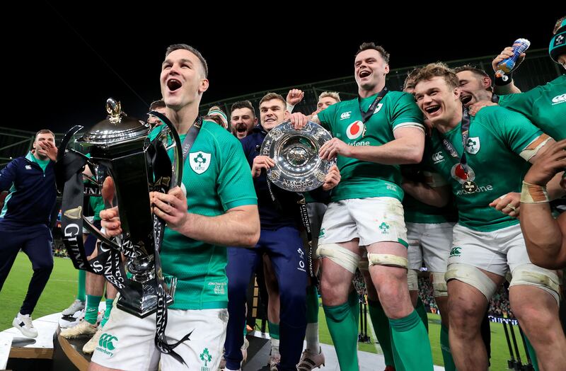 Ireland’s Johnny Sexton lifts the Six Nations trophy after winning the Grand Slam last March. International rugby guarantees huge audiences for RTÉ and Virgin Media Television. Photograph: INPHO/Dan Sheridan