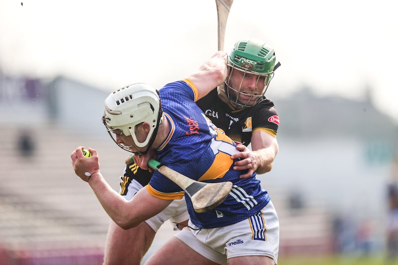 Tipperary's Darragh McCarthy  takes on Tommy Walsh of Kilkenny during their game in Nowlan Park. Photograph: Bryan Keane/Inpho