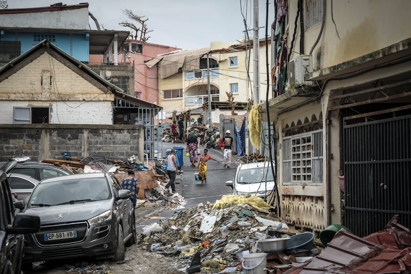 Piles of debris in Mamoudzou. Photograph: Sergey Ponomarev/The New York Times