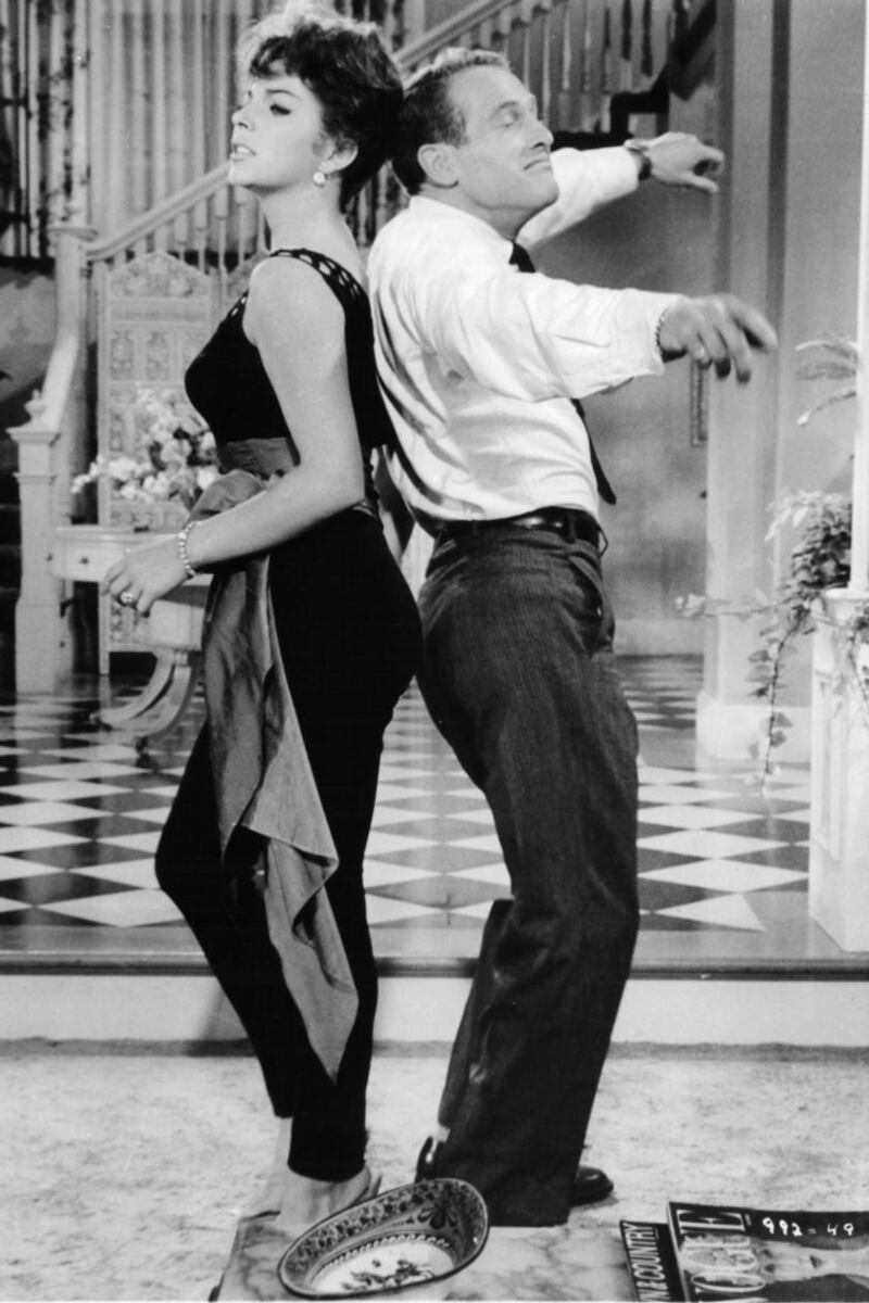 Joan Collins and Paul Newman in a scene from the film Rally ‘Round The Flag, Boys! in 1958. Photograph: 20th Century-Fox/Getty Images