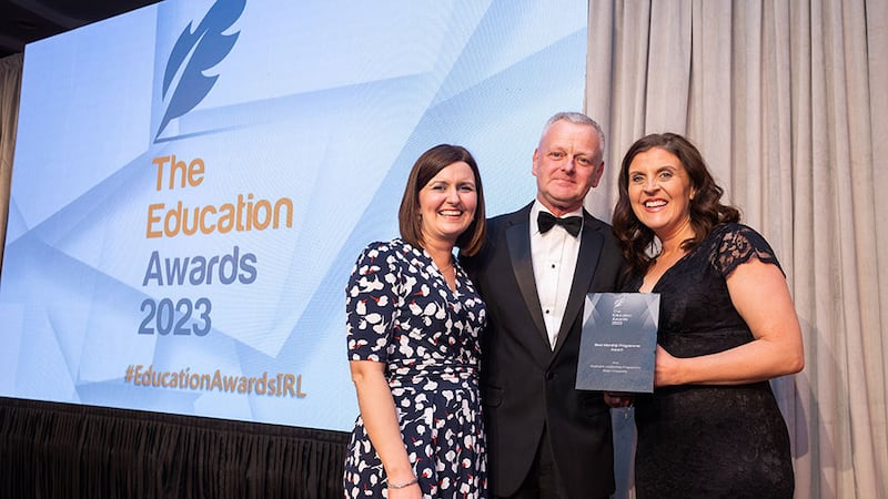 Dr. Ciarán Ó hAnnracháin, awards judge, presents the Best Internship Programme Award to Ursula McTaggart and Laura Cranston, Ulster University