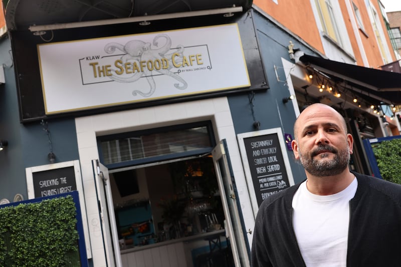 Niall Sabongi, outside The Seafood Cafe in Dublin. Photograph: Dara Mac Dónaill