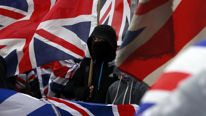 Loyalist protesters demonstrate against restrictions on flying Britain’s union flag from Belfast City Hall in central Belfast in 2013. File photograph: PA