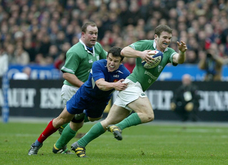 Ireland's Gordon D'Arcy and Frankie Sheahan with Damien Traille of France during the 2004 Six Nations clash in Paris. Photograph: Morgan Treacy/Inpho 