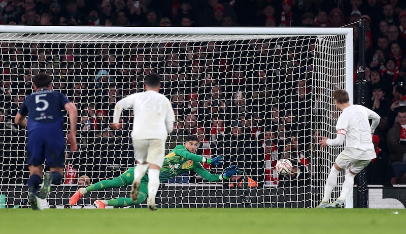 Manchester United's Altay Bayindir saves a penalty from Arsenal's Martin Odegaard during normal time of Sunday's FA Cup clash. Photo by Julian Finney/Getty Images