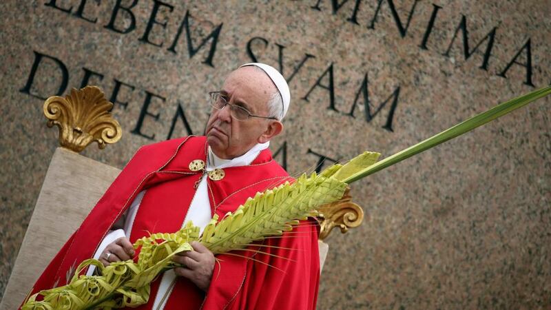 Pope Francis leads the Palm Sunday mass at Saint Peter’s Square at the Vatican. Photograph: Alessandro Bianchi/Reuters