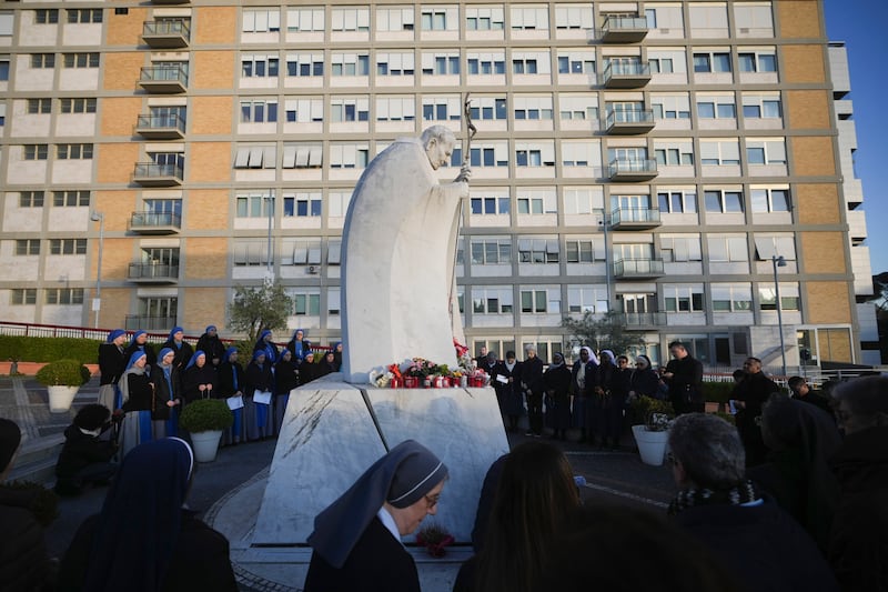 Nuns and priests pray for Pope Francis at a hospital in Rome. Photograph: Alessandra Tarantino/AP