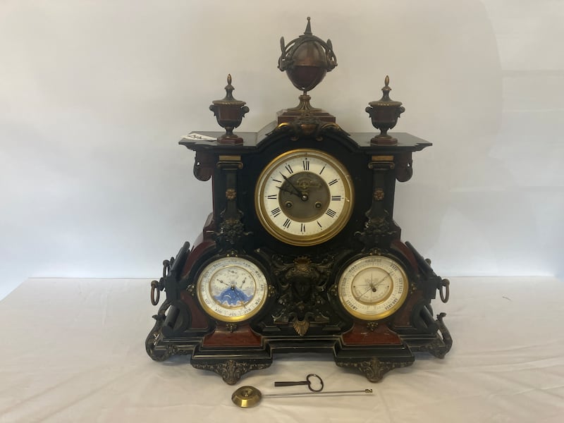 A 19th-century marble table or mantel clock with dials for time, weather and date (€400-€600)