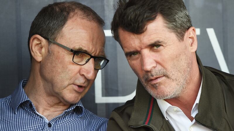 Michael O’Neill and Roy Keane watch on during Ireland Under-17s 1-0 win over Denmark. Photograph: Nathan Stirk/Getty