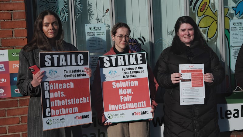 Kate Ní Dhubhlaoich, Eimear Ní Mhuiris and Orlaith Nic Gearailt taking part in the four-hour strike. Photograph: Éanna Ó Caollaí/The Irish Times