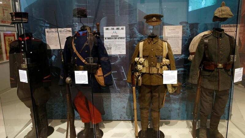 First World War uniforms (from left) from Belgium, France, Britain and Germany in the exhibition “Join Now! The British Empire’s Entry into The War” at the Museum of the Great War in Meaux. Photograph:  Reuters/Benoit Tessier