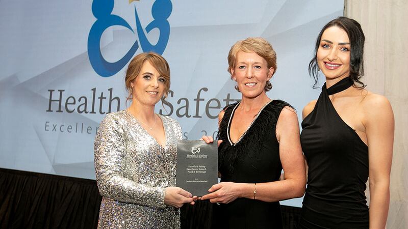 Ann Marie McLoughlin, awards judge, presents Health & Safety Excellence Award - Food & Beverage to Niamh O'Sullivan and Katie Smith, Danone Nutricia Wexford