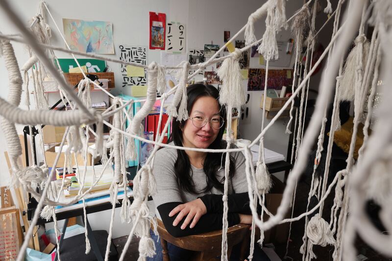 Jinny Ly, a textile artist, at her studio in Dublin 8. Photograph: Alan Betson