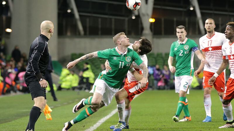 Ireland’s James McClean tussles  with Timm Klose of Switzerland during the European Championship clash at the Aviva in 2016. Photograph: Morgan Treacy/Inpho