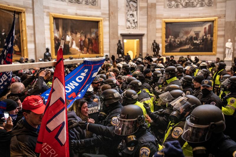 Protesters face off with police in the Rotunda, inside the Capitol in Washington, on January 6th, 2021. after listening to a speech by then president Donald Trump. President: Ashley Gilbertson/New York Times