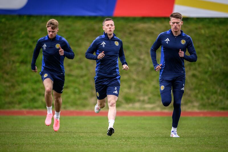 Scotland's Callum McGregor (c) and Scott McTominay (r) take part in the squad's training session at the team's base camp in Garmisch-Partenkirchen in advance of the Germany clash. Photograph: Fabrice Coffrini/AFP via Getty Images
