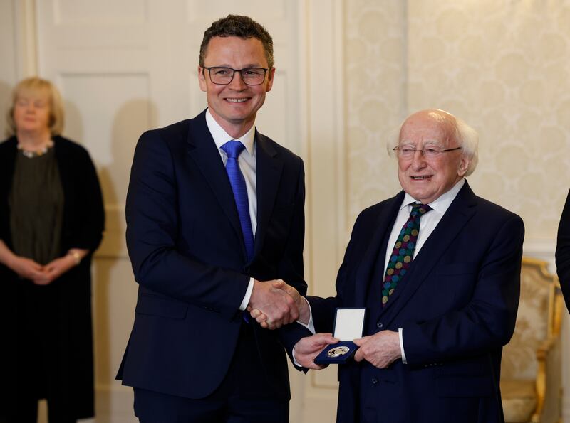 Patrick O'Donovan, Simon Harris's successor as Minister for Higher Education, with President Michael D Higgins. Photograph: Nick Bradshaw