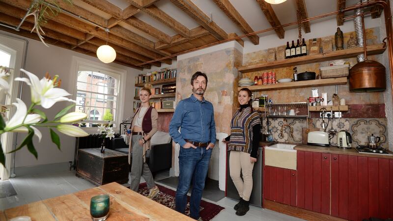 Jim Cogan with his sister Katie Cogan (left) and daughter Lara Cogan in the house’s main living space. Photograph: Alan Betson/The Irish Times