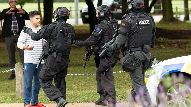 Armed Offenders Squad push back members of the public following Christchurch mosque shooting. Photograph: Martin Hunter/EPA