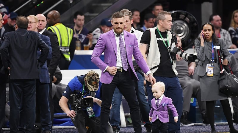 McGregor on the pitch with his son ahead of the Super Bowl in February. Photo: Harry How/Getty Images