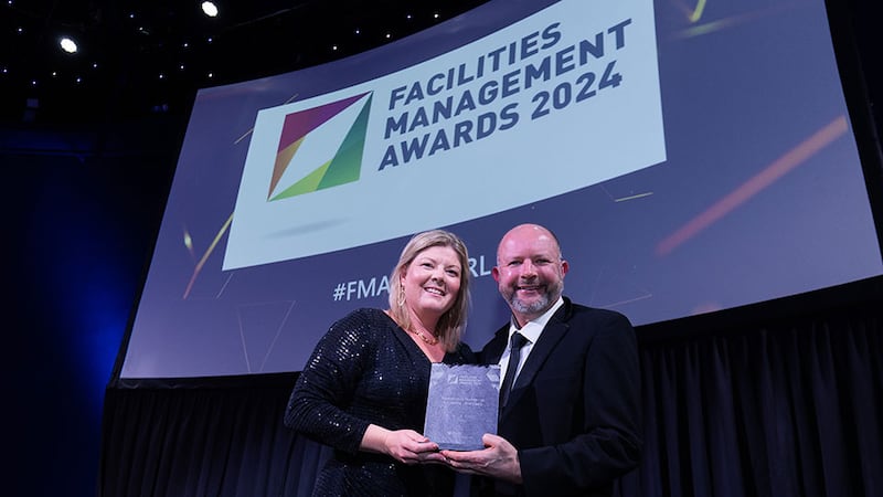 Triona Sheedy, HESQ manager of BAM Facilities Management, presents the innovation in technology & systems – end users award to Ian Glendon, Mitie Ireland