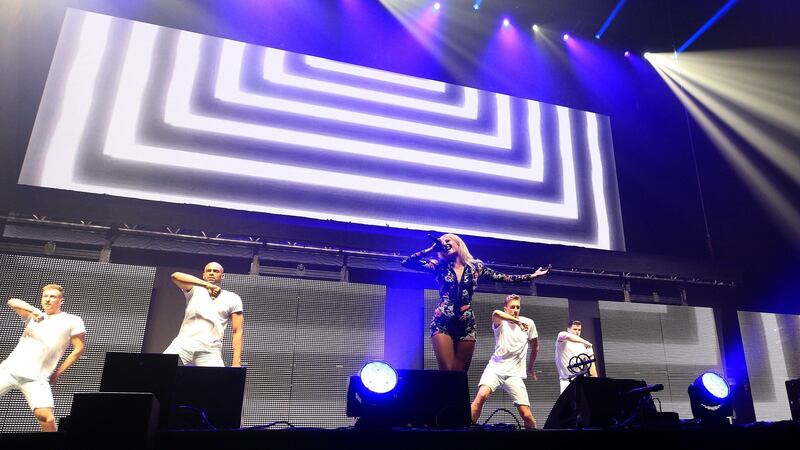 Pixie Lott performs during the We Are Manchester benefit benefit show, amid heightened security at the re-opening of the Manchester arena on Saturday night  for the first time since the terror attack in May. Photograph: Peter Byrne/PA Wire