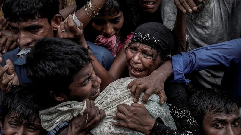 Rohingya refugees scramble for aid at a camp in Cox’s Bazar, Bangladesh in September 2017. Photograph: Cathal McNaughton/Reuters