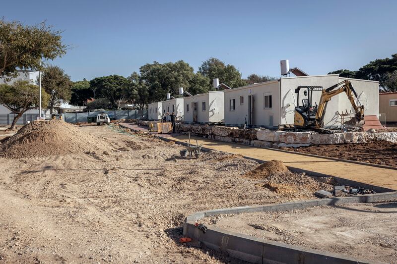 Temporary homes under construction in Shefayim, Israel, for families from Kfar Aza in December. Photograph: Avishag Shar-Yashuv/New York Times
                      