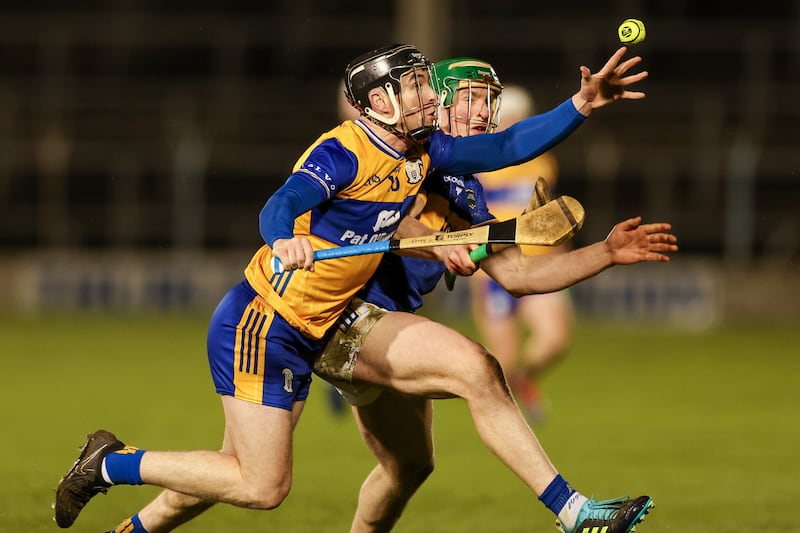 Clare's Tony Kelly in action against Tipp's Brian McGrath at Semple Stadium. Photograph: Natasha Barton/Inpho