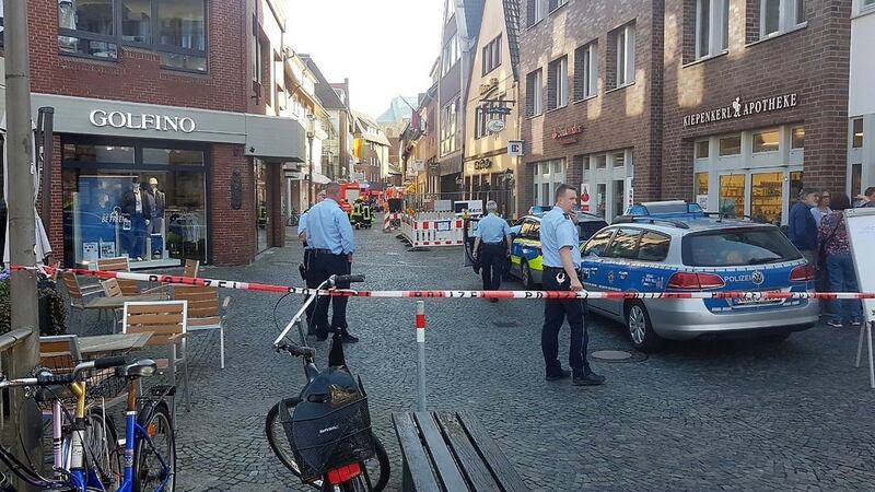 Policemen stand at a barricade to the inner city of Muenster on Saturday where  a man drove into a crowd and then killed himself. Photograph: EPA