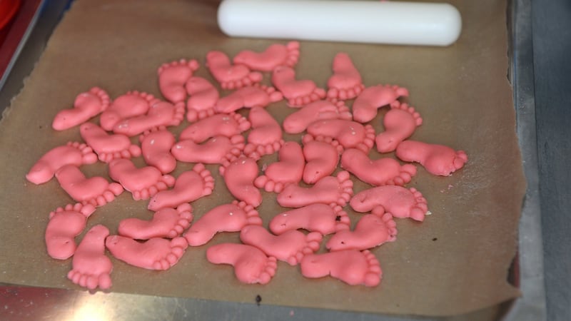 Pink footprints made of icing  for each new arrival in the Rotunda Hospital. Photograph: Dara Mac Dónaill / The Irish Times