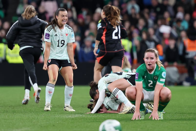 Ireland's Jessie Stapleton is dejected as Wales's Ella Powell celebrates on Tuesday. Photograph: Damian Eagers/PA Wire