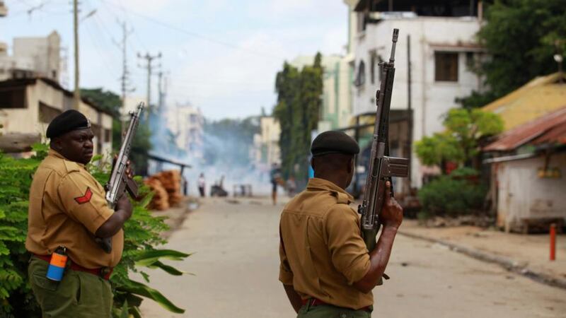 Kenya police attempt to suppress demonstrators reacting to the killing of an Islamic cleric at Kenya’s coastal city of Mombasa today. Photograph: Joseph Okanga/Reuters