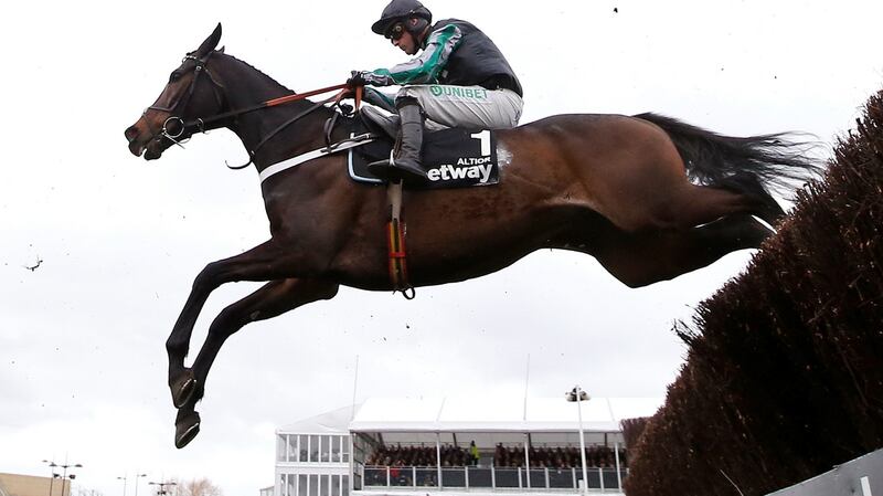 Altior ridden by Nico de Boinville (left) comes over the last on their way to victory in the Betway Queen Mother Champion Chase during Ladies Day of the 2019 Cheltenham Festival at Cheltenham Racecourse. Photo: Paul Childs/Reuters