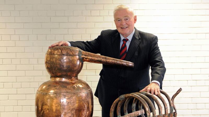 John Teeling of the Great Northern Distillery with an old still