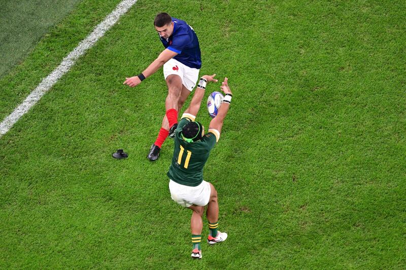 France's full-back Thomas Ramos has his conversion attempt blocked by South Africa's winger Cheslin Kolbe. Photograph: Miguel Medina/AFP via Getty Images