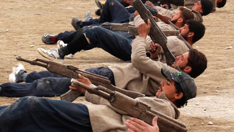 Recruits train to be part of the Free Syrian Army in eastern al-Ghouta, near Damascus. Photograph: Ammar al-Bushy/Reuters