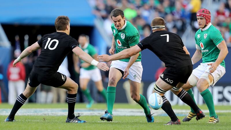 Ireland outhalf Johnny Sexton in action against Beauden Barrett and Sam Cane of new Zealand during the game at Soldier Field in Chicago  in November 2016. Photograph: Dan Sheridan/Inpho